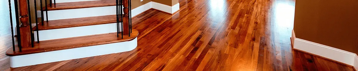 Base floor of a staircase with professionally restored wood flooring in Mesa AZ